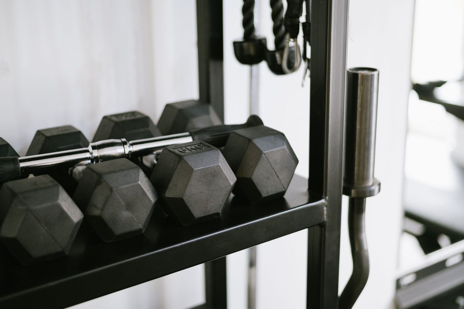Hex dumbbells on a rack